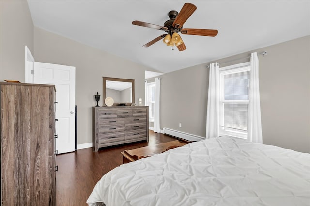 bedroom featuring lofted ceiling, dark wood-type flooring, ceiling fan, and baseboard heating