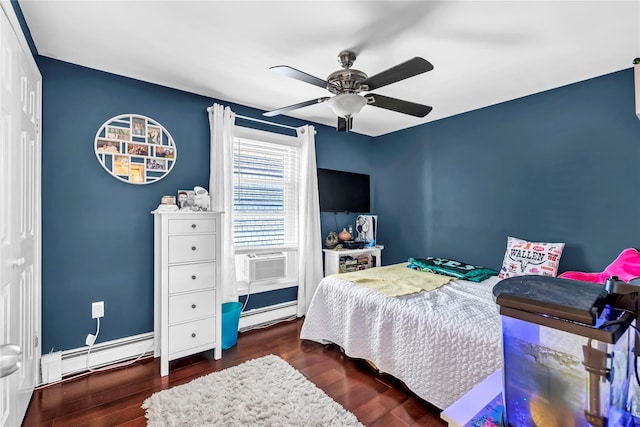 bedroom featuring a baseboard heating unit, dark hardwood / wood-style floors, cooling unit, and ceiling fan