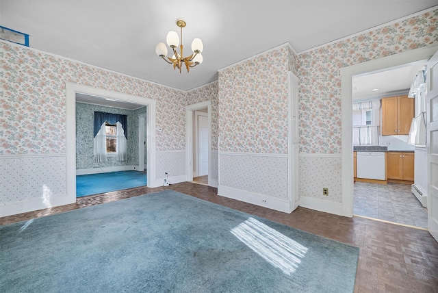 tiled spare room with an inviting chandelier and a baseboard radiator