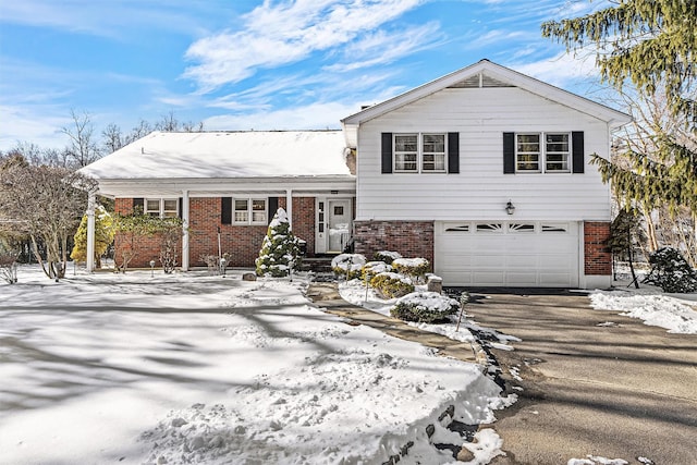 split level home featuring a garage