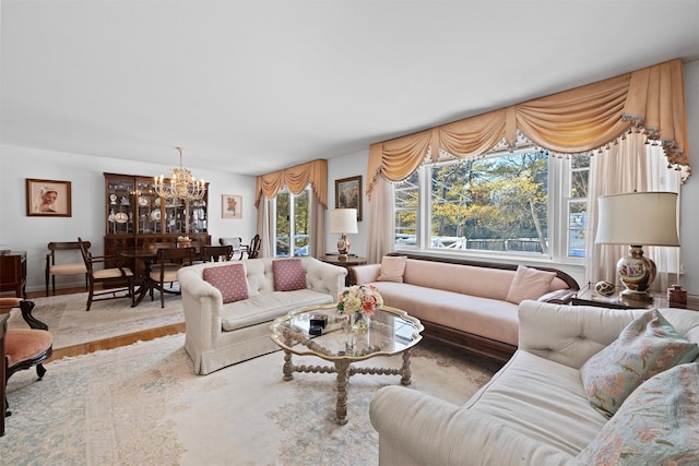 living room with an inviting chandelier