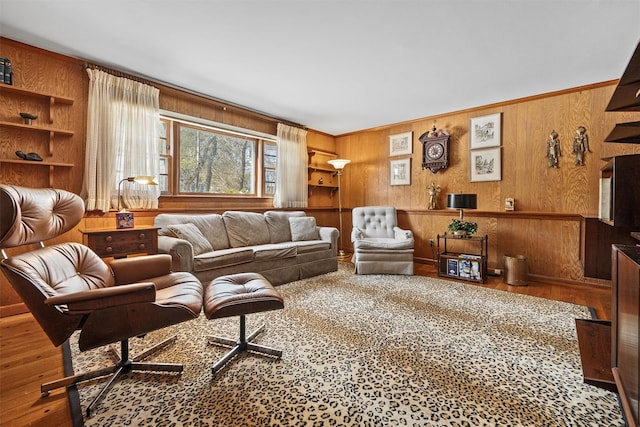 living room featuring wooden walls