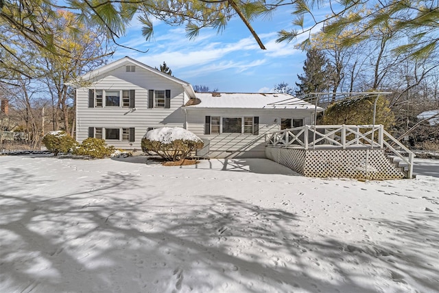 view of snow covered property