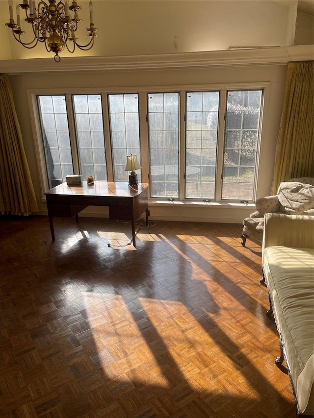 interior space featuring a notable chandelier and dark parquet floors