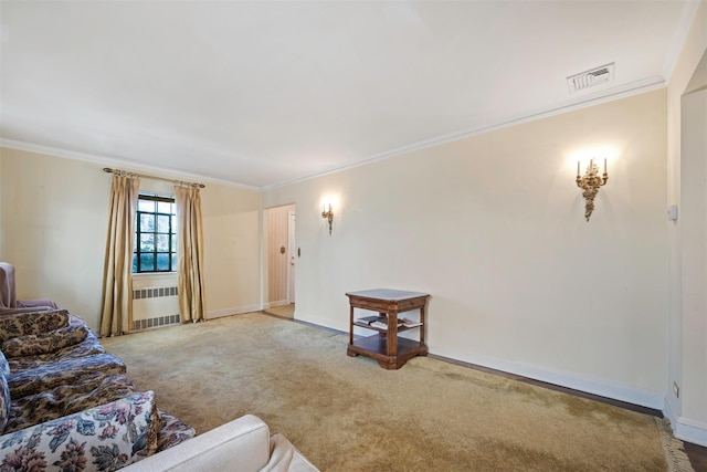 47-44 Glenwood St, Little Neck, NY 11362 - living area featuring radiator heating unit, carpet floors, crown molding, and baseboards