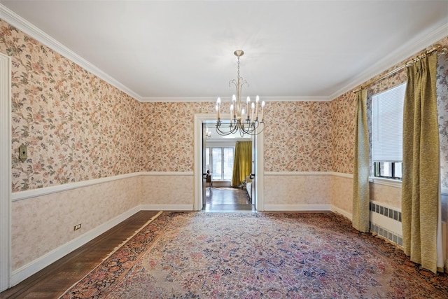47-44 Glenwood St, Little Neck, NY 11362 - unfurnished room with wallpapered walls, a chandelier, wood finished floors, ornamental molding, and baseboards