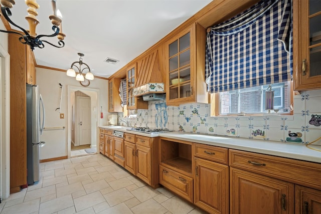 47-44 Glenwood St, Little Neck, NY 11362 - kitchen featuring freestanding refrigerator, tasteful backsplash, brown cabinetry, light countertops, and glass insert cabinets