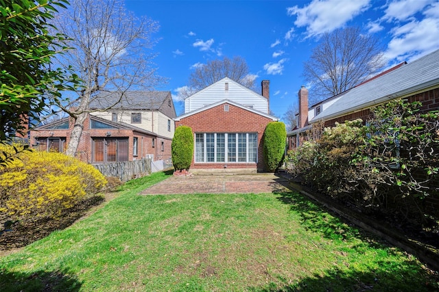 47-44 Glenwood St, Little Neck, NY 11362 - back of property featuring brick siding and a patio