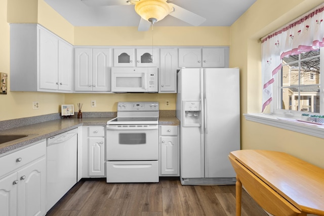 kitchen with ceiling fan, white appliances, dark hardwood / wood-style floors, and white cabinets