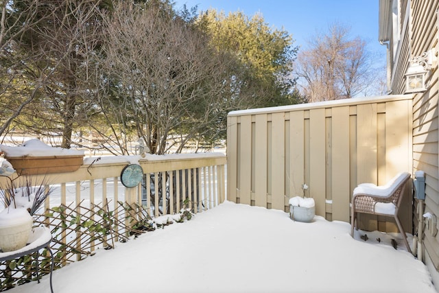 view of snow covered deck