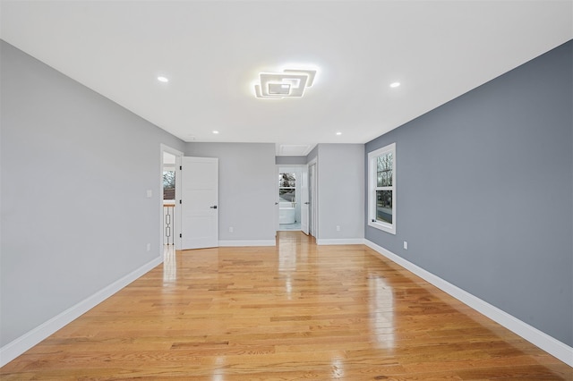 unfurnished living room featuring light hardwood / wood-style flooring