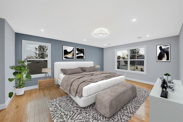 bedroom with light wood-type flooring