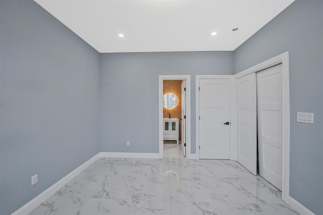 unfurnished bedroom featuring a closet