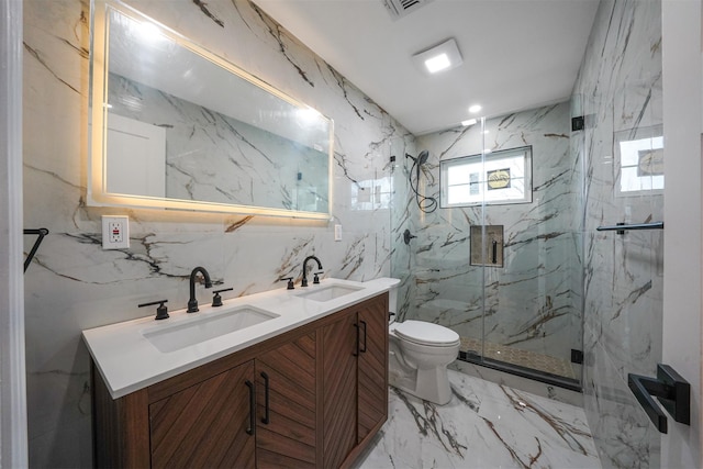 bathroom with an enclosed shower, vanity, toilet, and tile walls