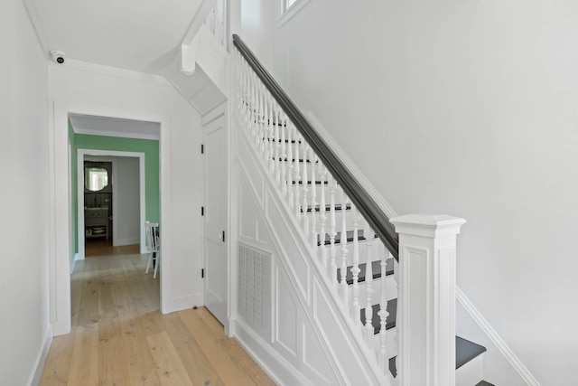 stairway featuring hardwood / wood-style floors