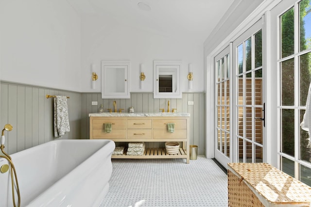 bathroom featuring vanity and a bathtub