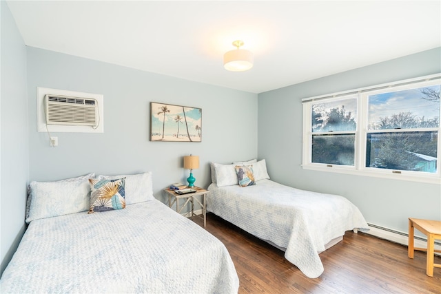 bedroom featuring a wall mounted air conditioner, a baseboard radiator, wood finished floors, and multiple windows