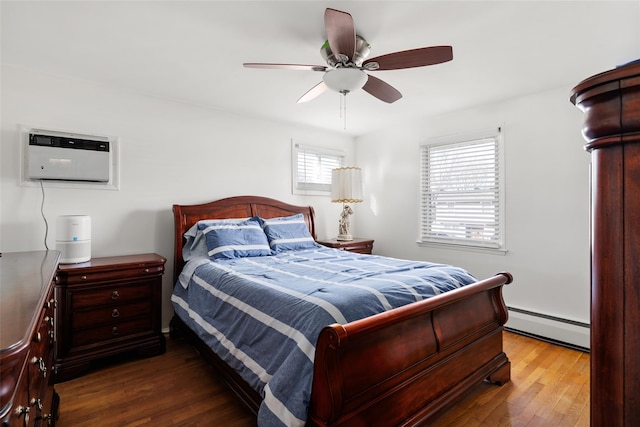 bedroom with wood-type flooring, a wall mounted AC, ceiling fan, and baseboard heating