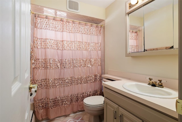 bathroom with vanity, a shower with shower curtain, tile patterned floors, and toilet