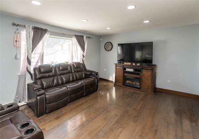 living room featuring dark hardwood / wood-style floors