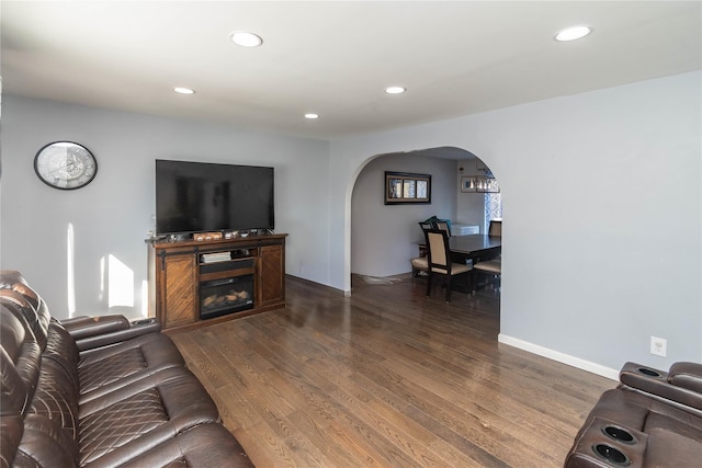 living room with dark wood-type flooring