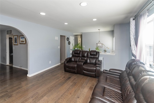 living room with dark wood-type flooring