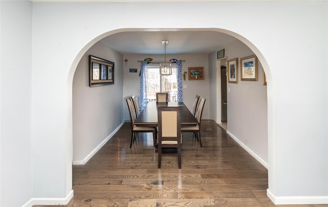 dining area featuring dark hardwood / wood-style flooring