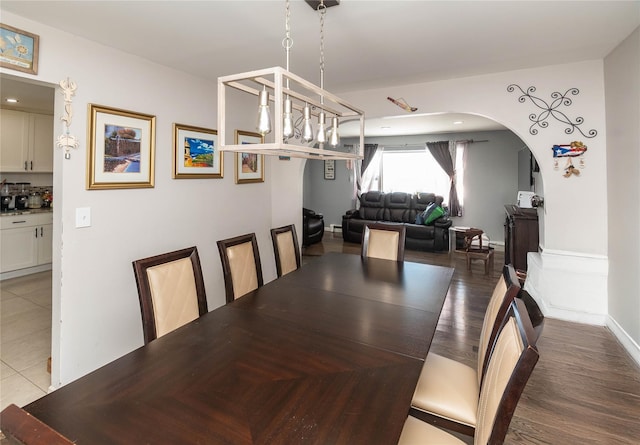 dining room with hardwood / wood-style floors