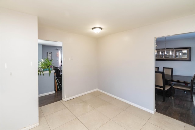 empty room with light tile patterned flooring