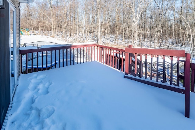 view of snow covered deck