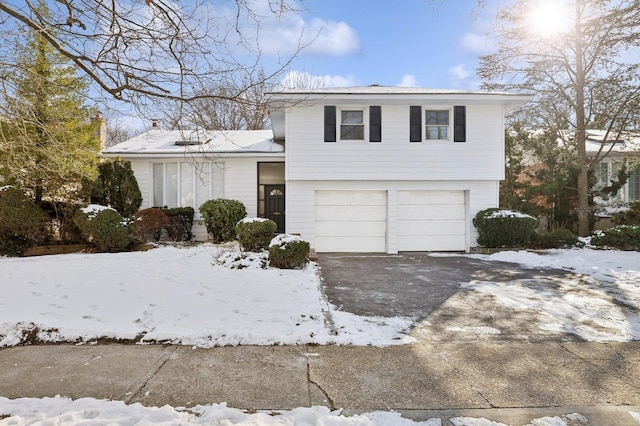 split level home featuring a garage