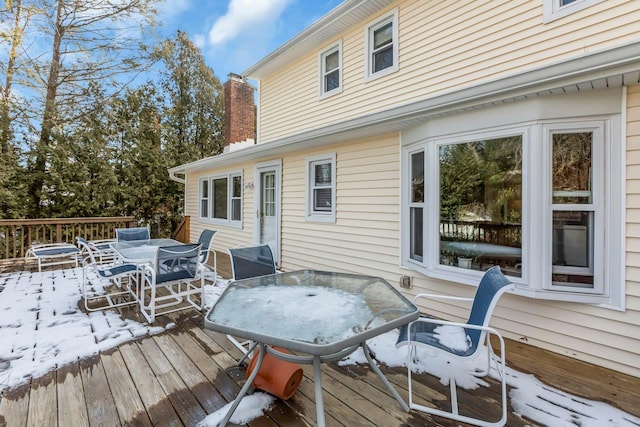 view of snow covered deck