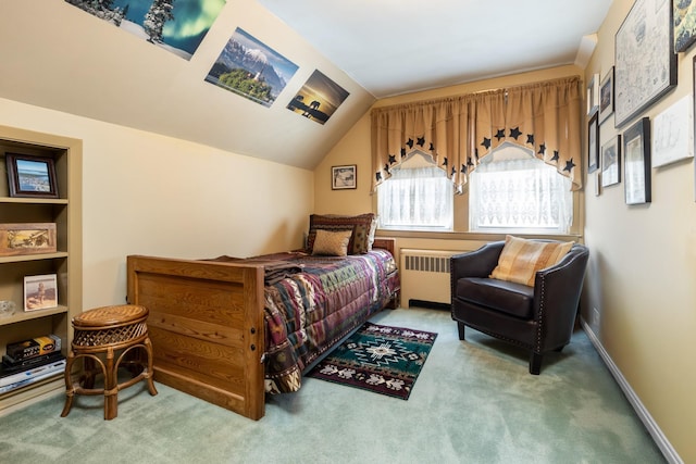 bedroom featuring lofted ceiling, radiator heating unit, and light colored carpet