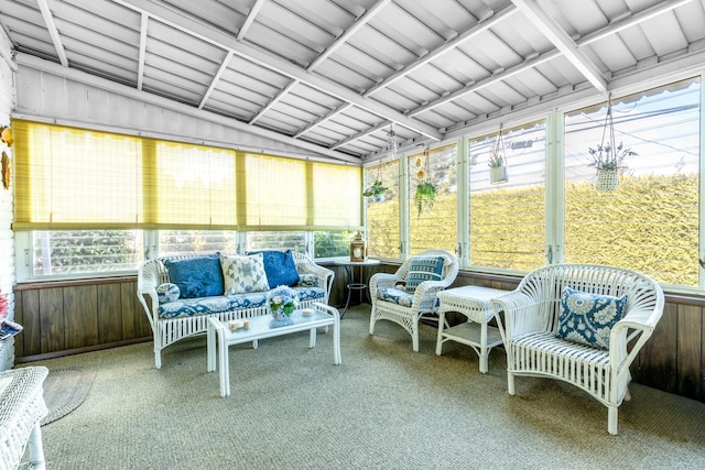 sunroom featuring a wealth of natural light and vaulted ceiling