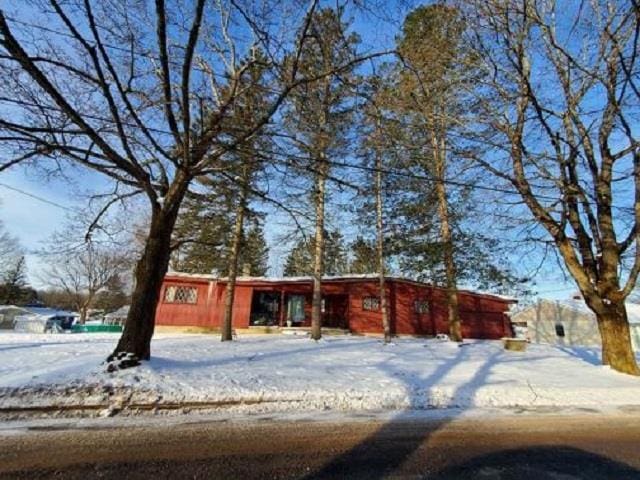 view of snow covered house