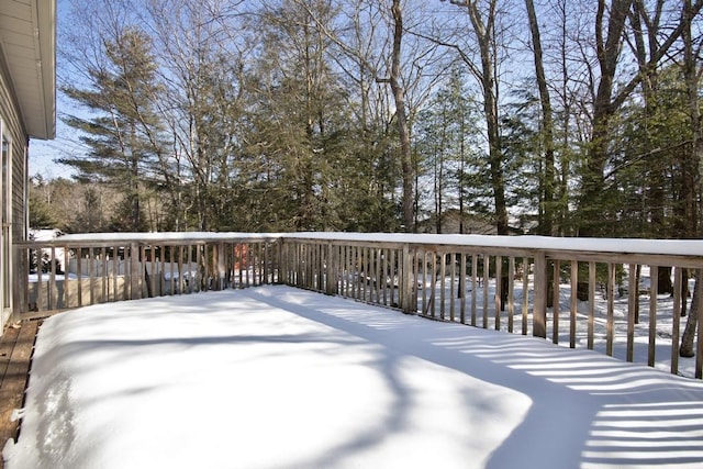 view of snow covered deck