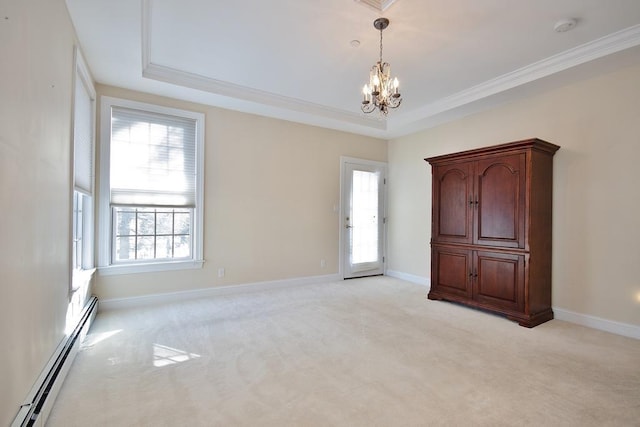 unfurnished room featuring light carpet, baseboards, a baseboard radiator, a tray ceiling, and a notable chandelier