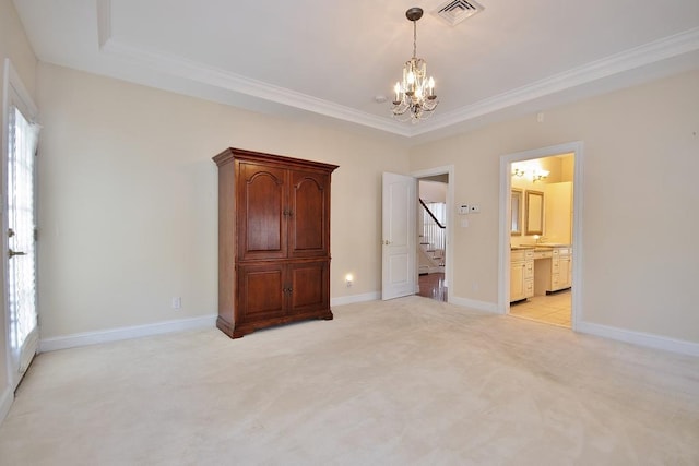 unfurnished bedroom featuring light carpet, baseboards, visible vents, and a notable chandelier