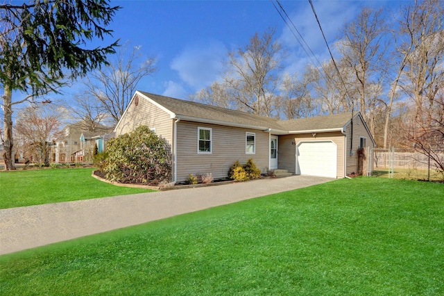 view of front of home with a garage and a front yard