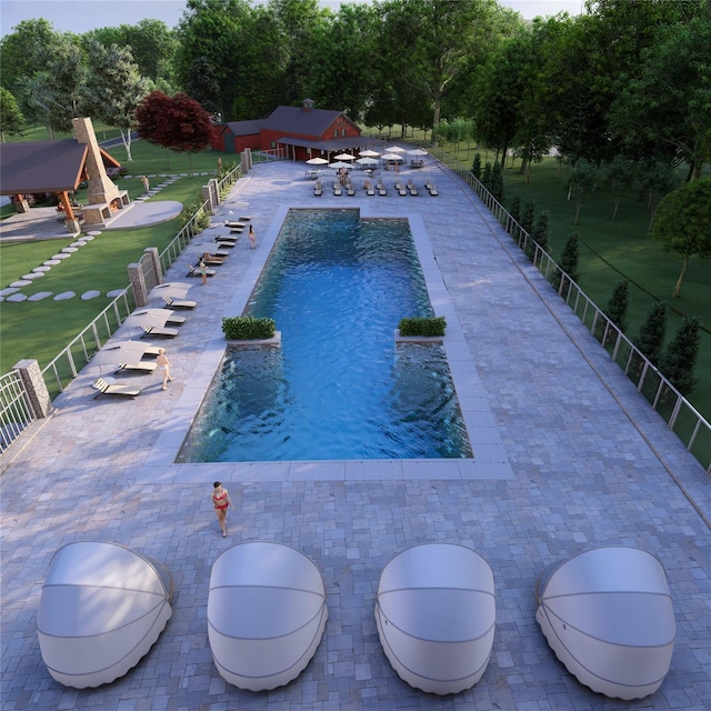 view of swimming pool with a patio and a lawn