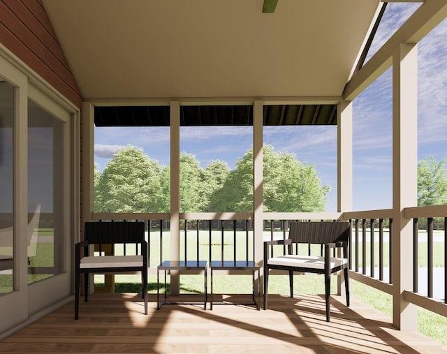 sunroom with lofted ceiling and a healthy amount of sunlight