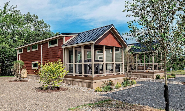 197 Wheeler Rd, Florida, NY 10921 - rear view of house with a sunroom, a metal roof, a deck, and a standing seam roof