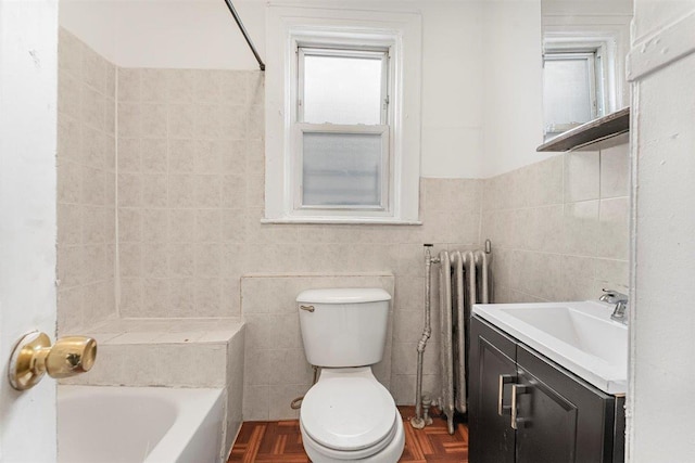 bathroom featuring radiator heating unit, a healthy amount of sunlight, parquet flooring, and toilet