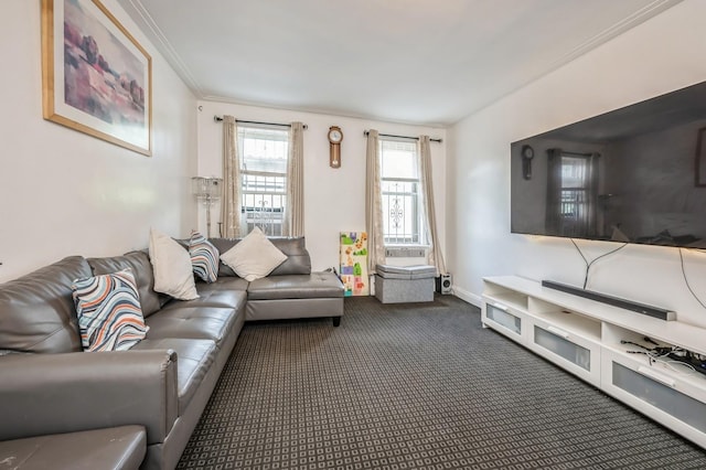 carpeted living room with crown molding