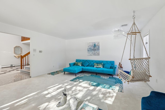 living room with carpet and a baseboard heating unit