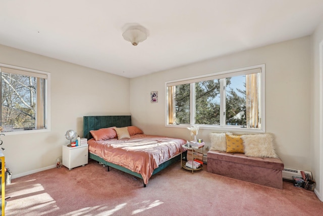 bedroom featuring carpet floors and baseboard heating