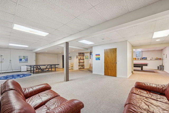 living room with a paneled ceiling, pool table, and carpet