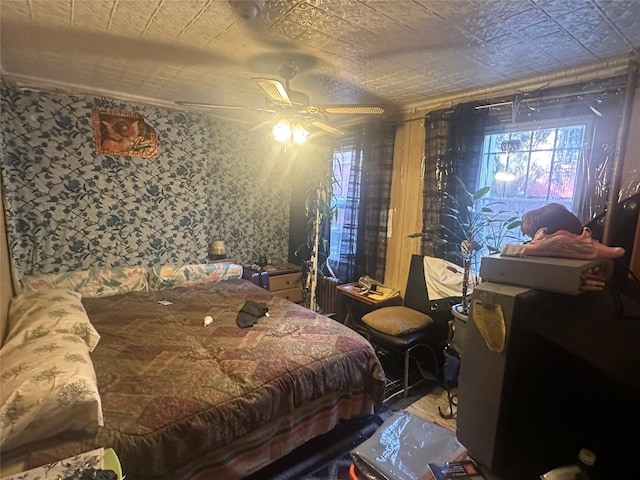 bedroom featuring ceiling fan