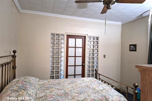 bedroom featuring crown molding and ceiling fan