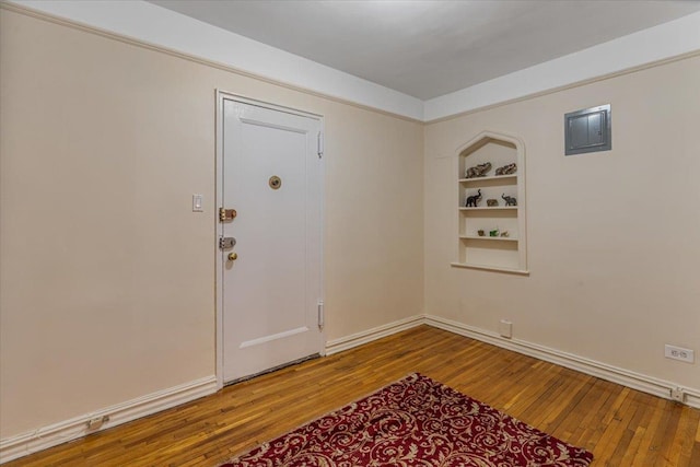 foyer entrance featuring hardwood / wood-style floors